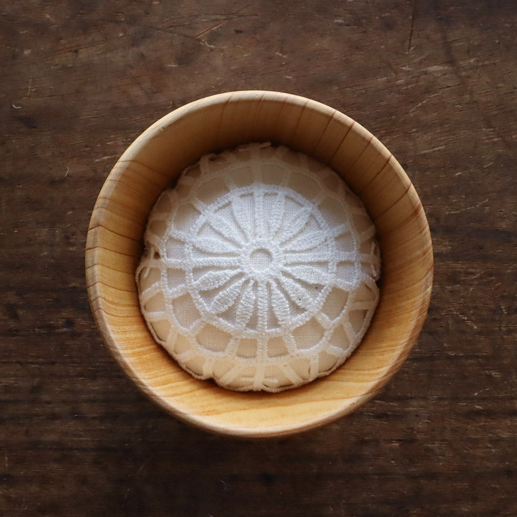 Sinking pin cushion