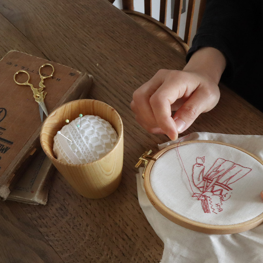 Sinking pin cushion