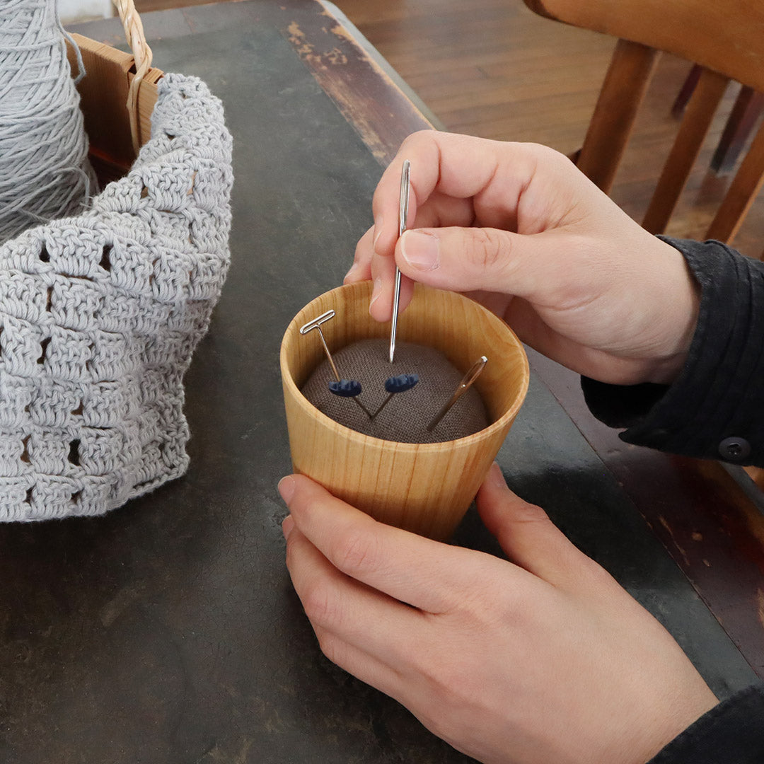 Sinking pin cushion
