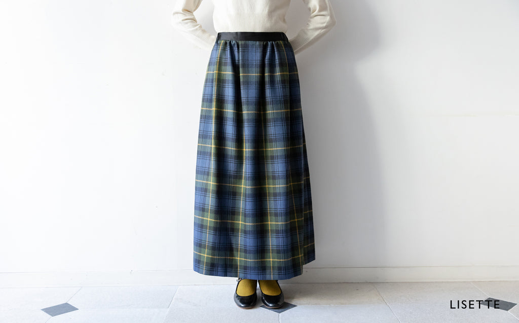 洗練されたシルエットのマキシ丈スカート「メラーニア」