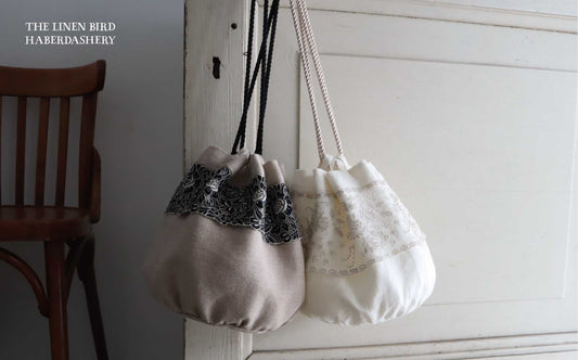 繊細なチュールレースが美しい、まるい底の巾着キット