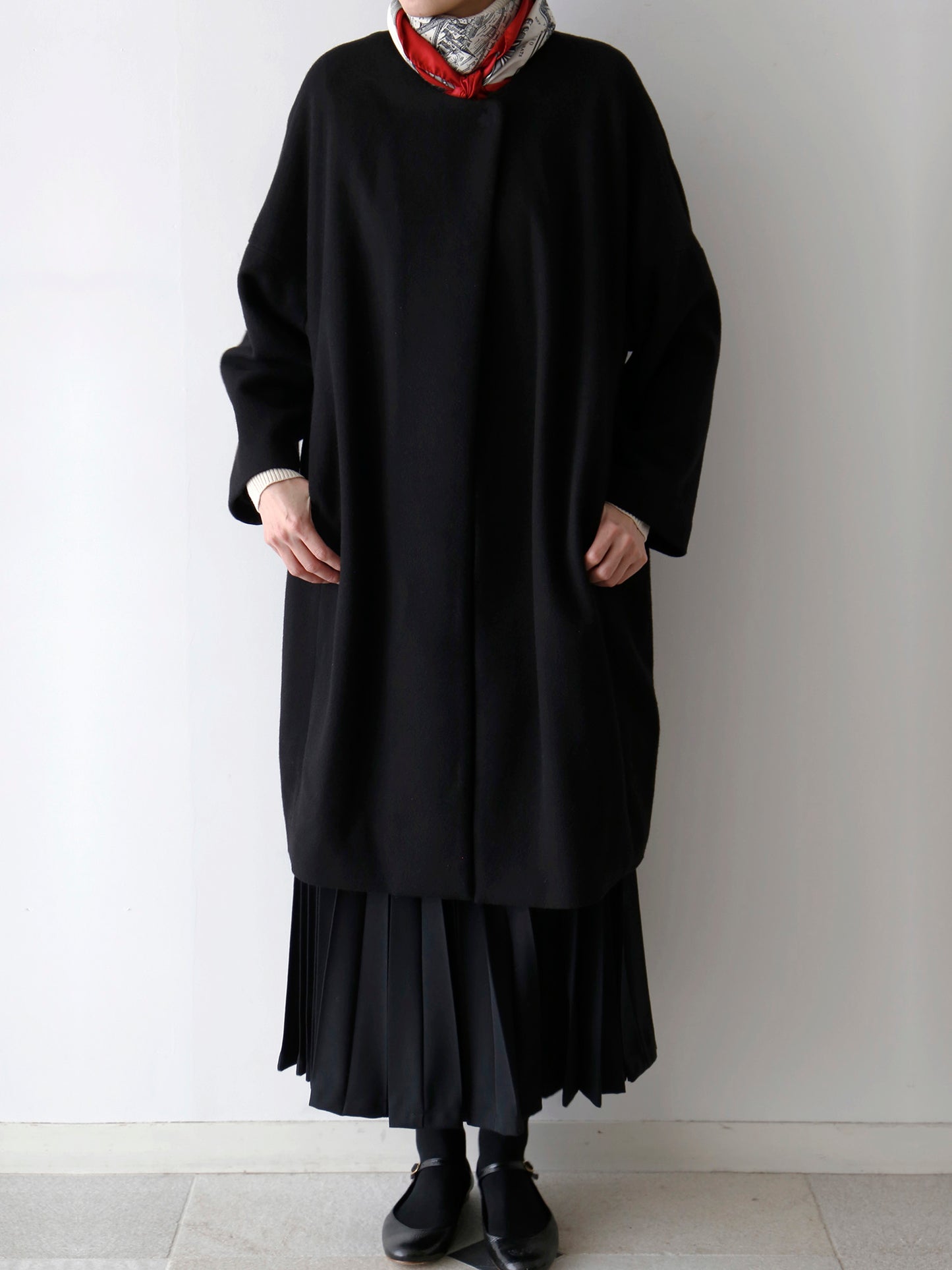 コート：ノヴェッラ、スカート：アンナリーナ（モデル身長166cm）