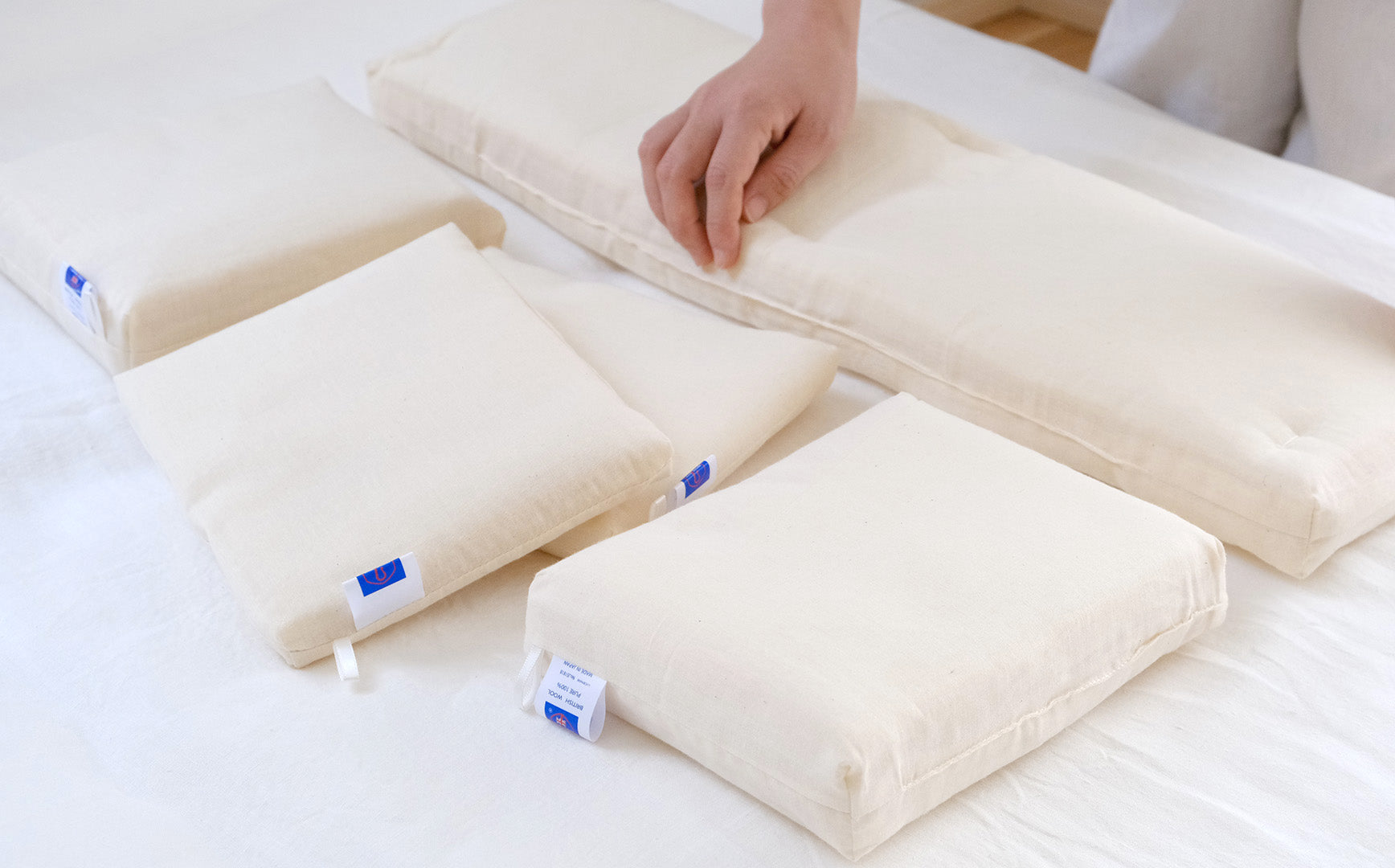 自然で育まれた羊毛の調湿力でさらっと快適。洗えるウールユニット